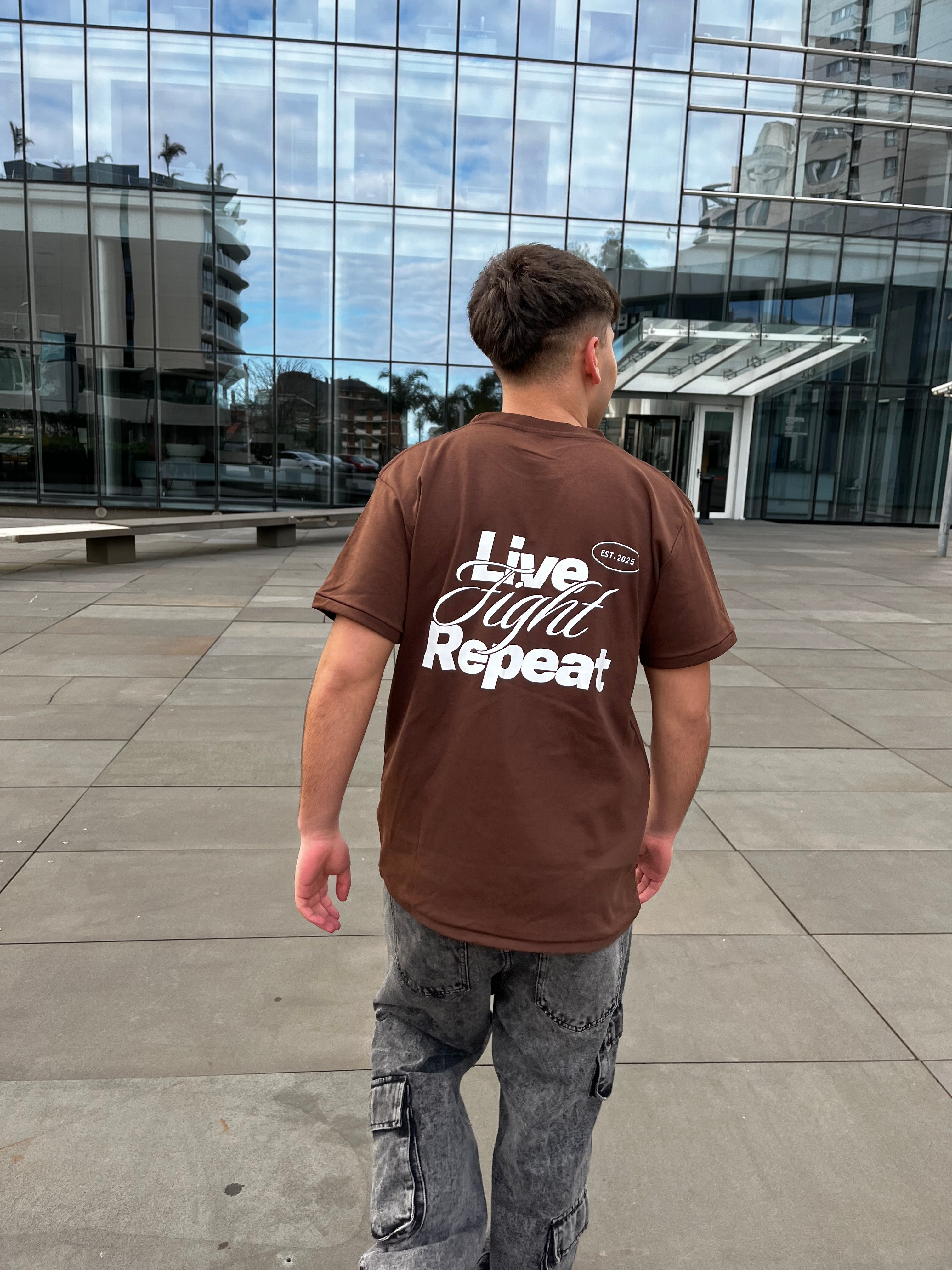 REMERA LIVE FIGTH REPEATE