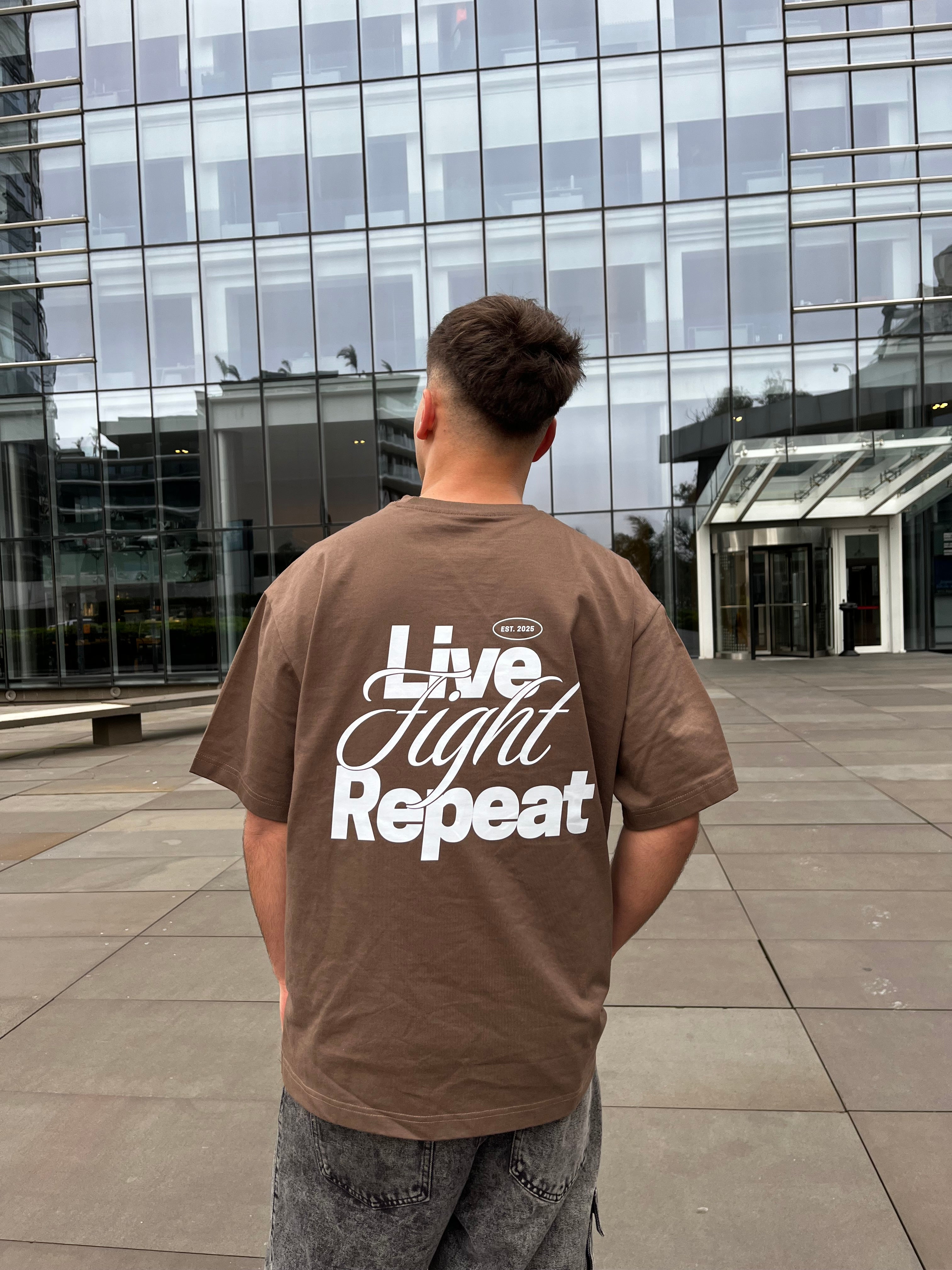 REMERA LIVE FIGTH REPEATE